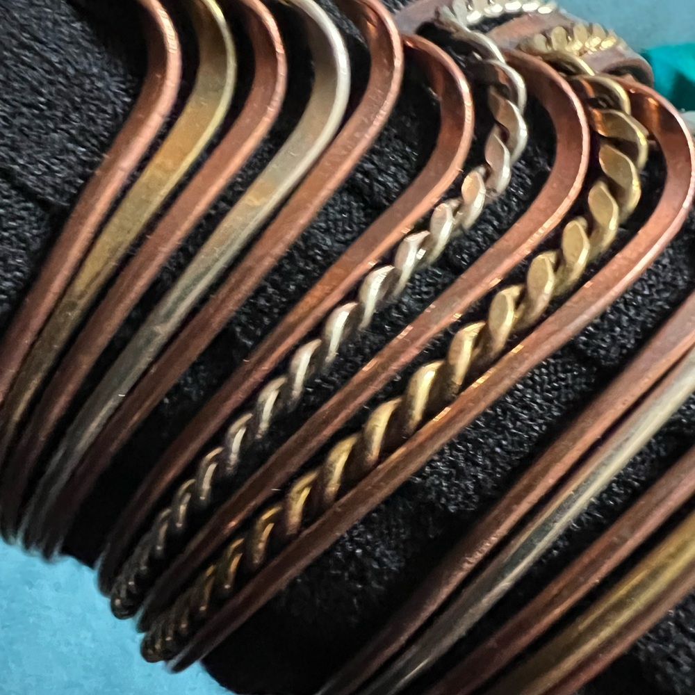 4 copper and various metal bracelets